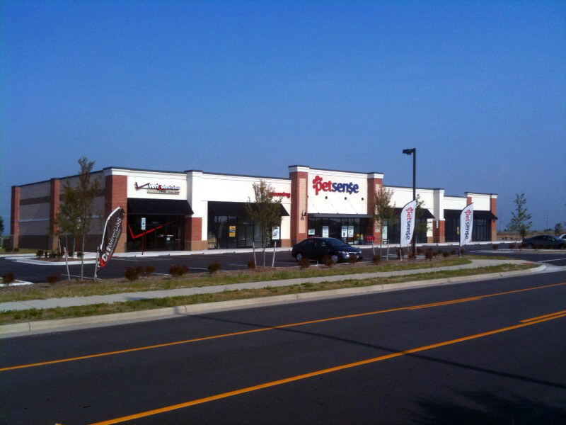 Shopping center exterior featuring petsense and Verizon Wireless